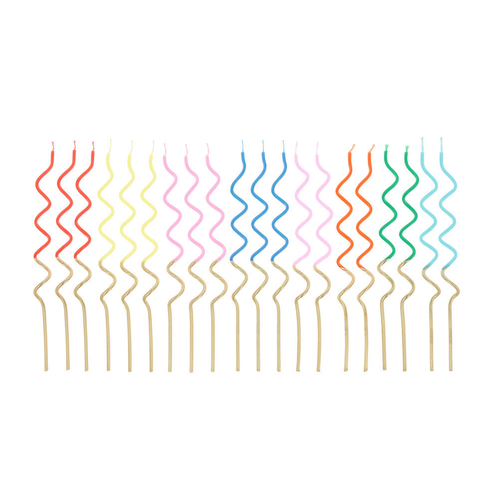 Gold dipped swirly candles