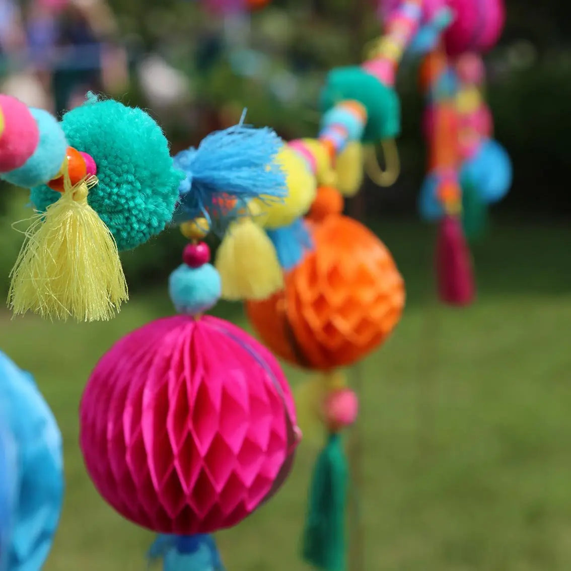 Colourful Pom Pom Garland with Tassel Talking Tables