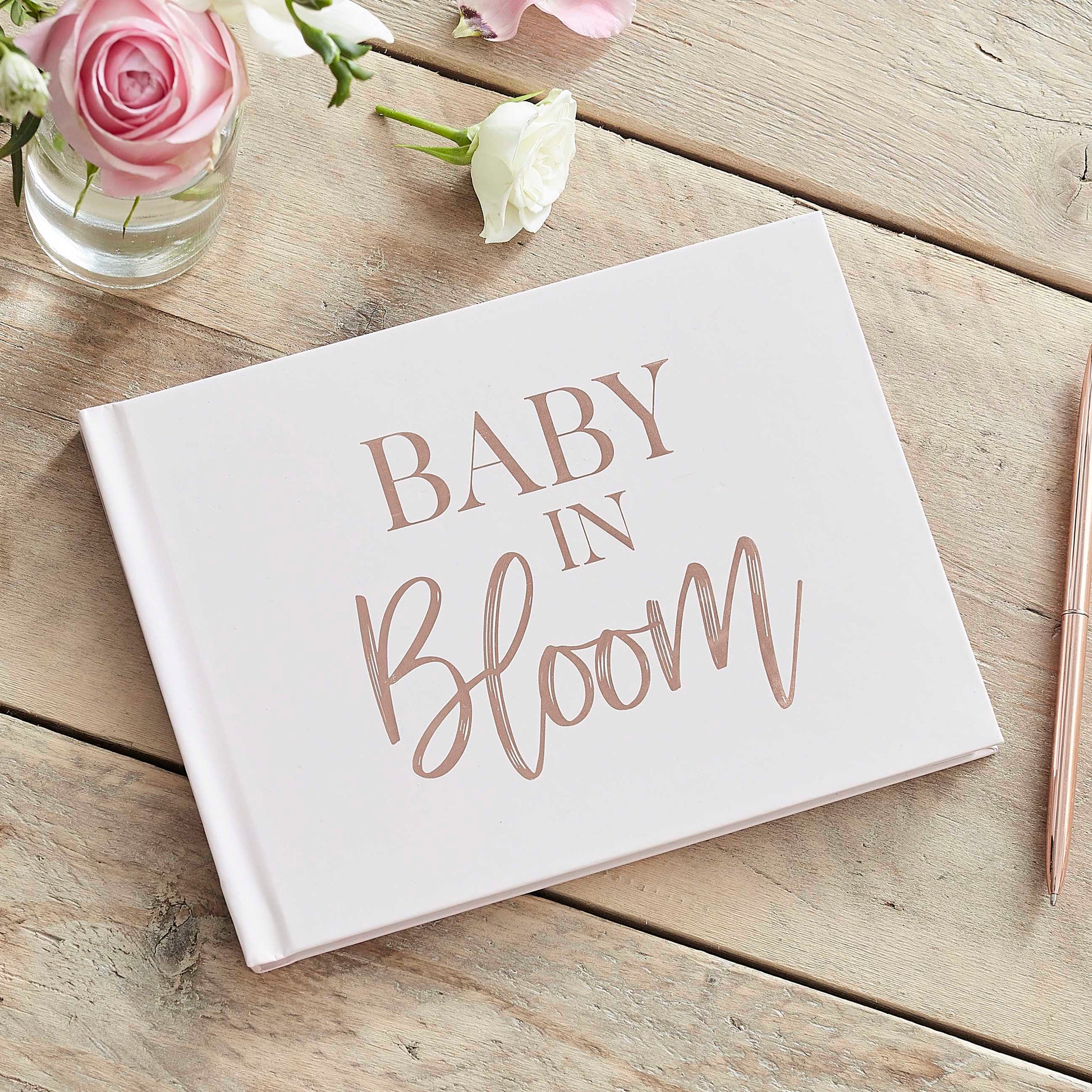 Rose gold and powder-colored baby shower guestbook Ginger Ray